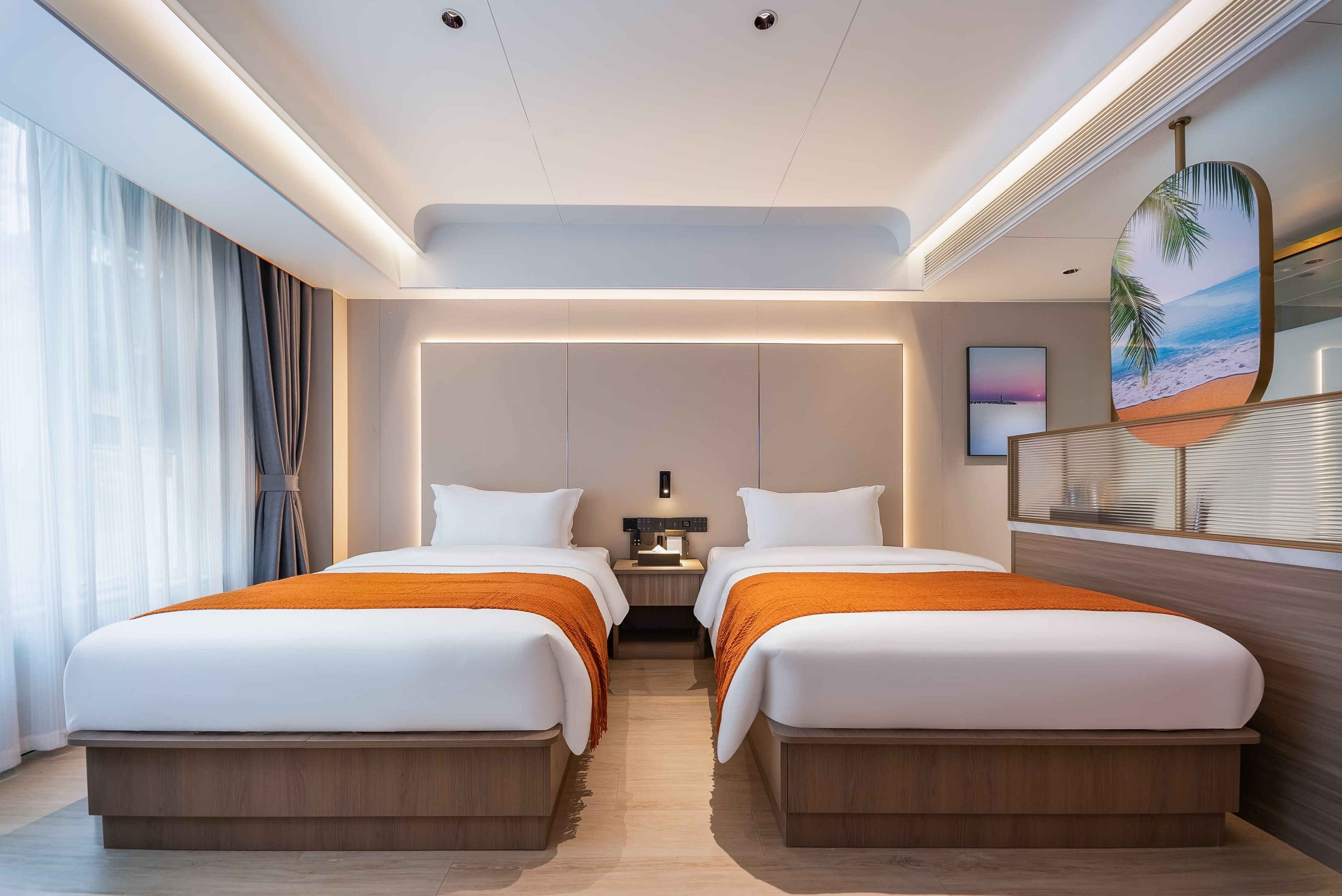 A modern hotel room with two beds, a nightstand, a wall-mounted TV, and a large window with curtains.