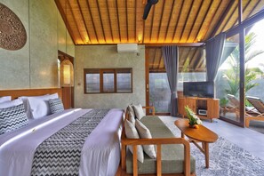 Villa Deluxe, balcón, vistas a la piscina | Escritorio, espacio para trabajar con un portátil, wifi gratis