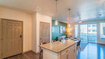 Exclusive Apartment | Private kitchen | Full-size fridge, microwave, oven, stovetop