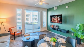 Elite Apartment | Living area | 55-inch Smart TV with digital channels