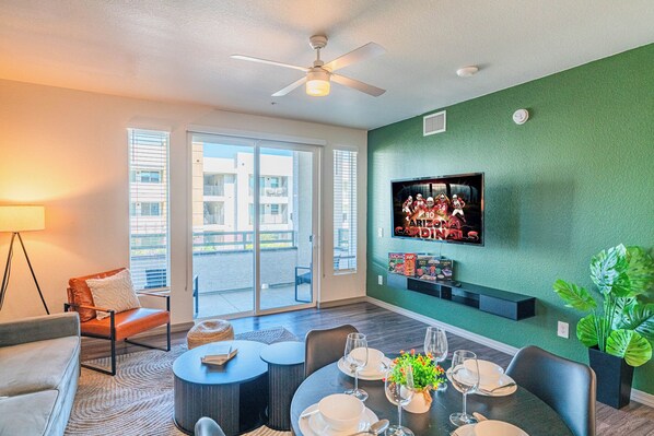 Elite Apartment | Living area | 55-inch Smart TV with digital channels