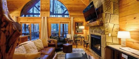 Télévision, cheminée, table de tennis de table