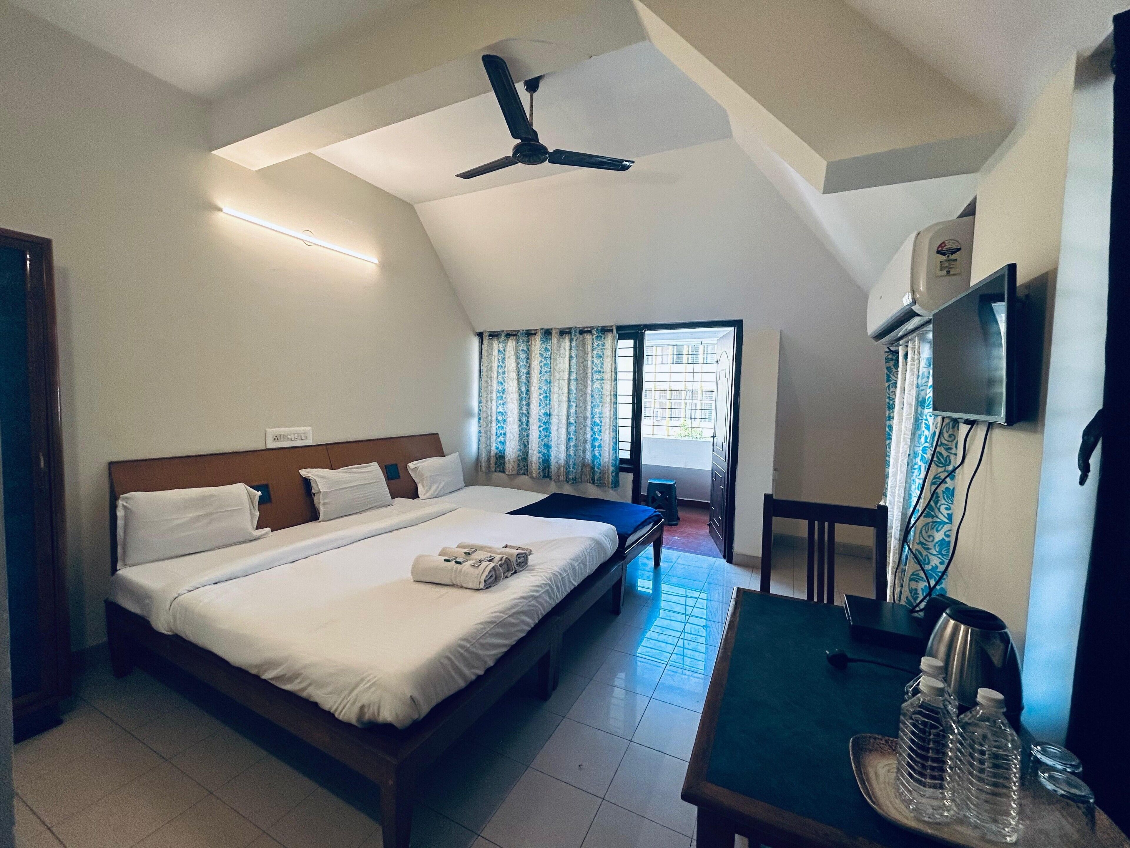 Deluxe Double Room, Balcony, City View | Desk, laptop workspace, free WiFi