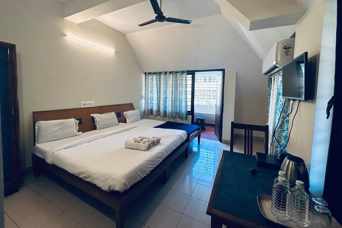 Deluxe Double Room, Balcony, City View | Desk, laptop workspace, free WiFi