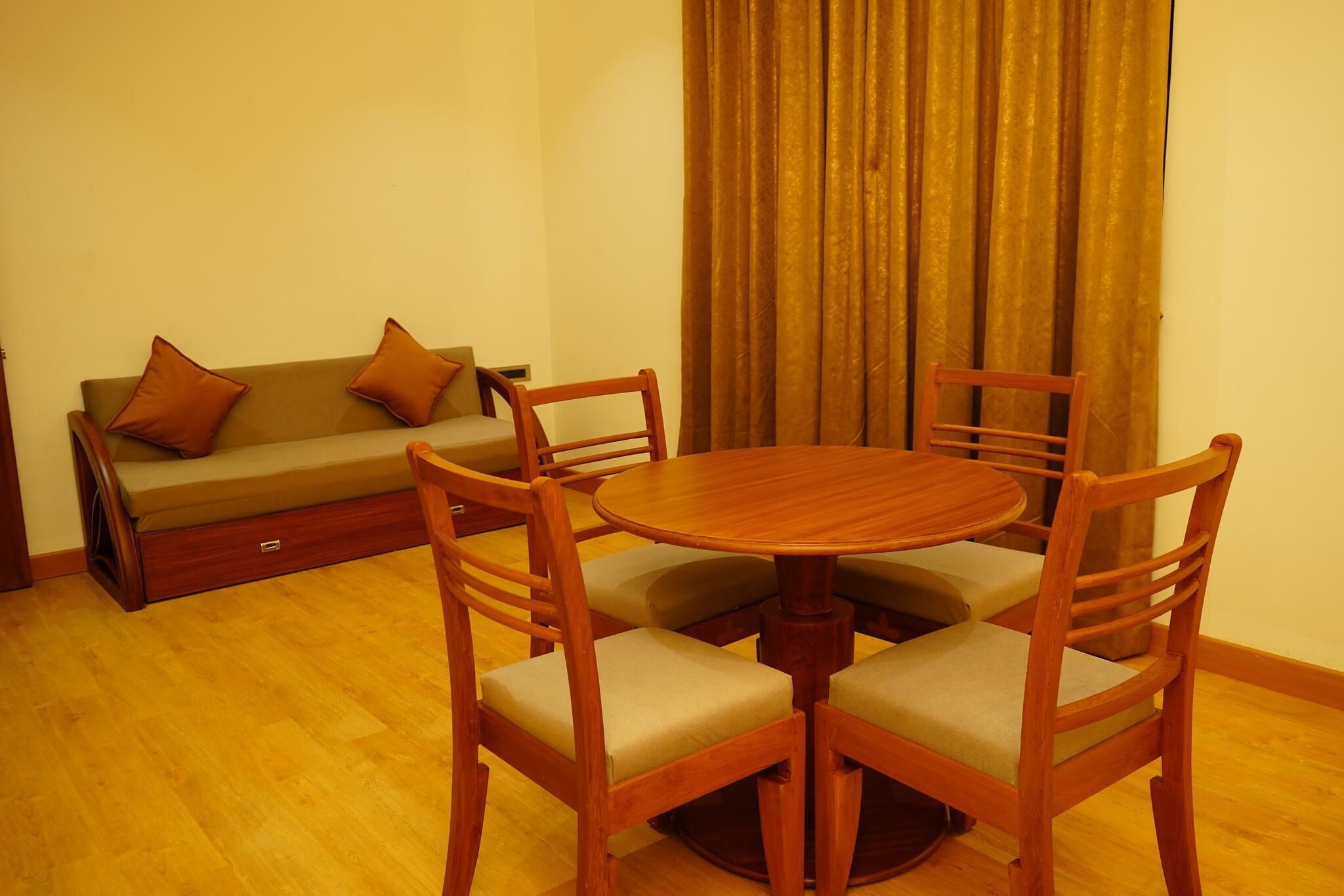 Deluxe Villa, 1 King Bed with Sofa bed, Patio, Garden View | Living area | 40-inch LED TV with satellite channels