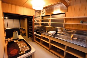 Fridge, microwave, stovetop, cookware/dishes/utensils