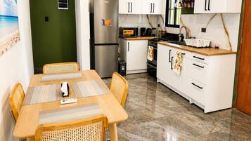 Coffee/tea maker, microwave, dishwasher, cookware/dishes/utensils