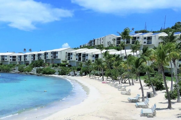 Cowpet Bay Beach with complimentary loungers for guests