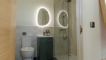Shower, eco-friendly toiletries, hair dryer, towels