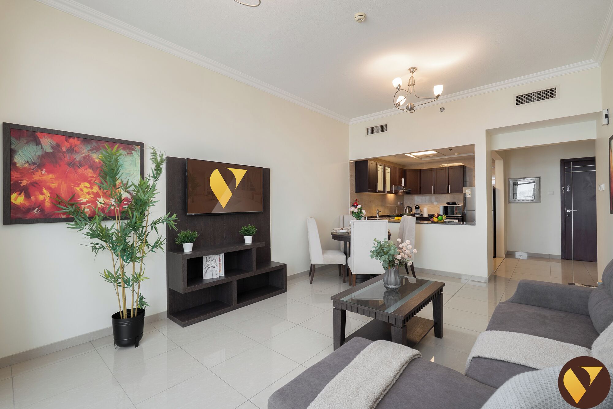 Luxury Apartment, Balcony, City View | Living area | 65-inch Smart TV with cable channels