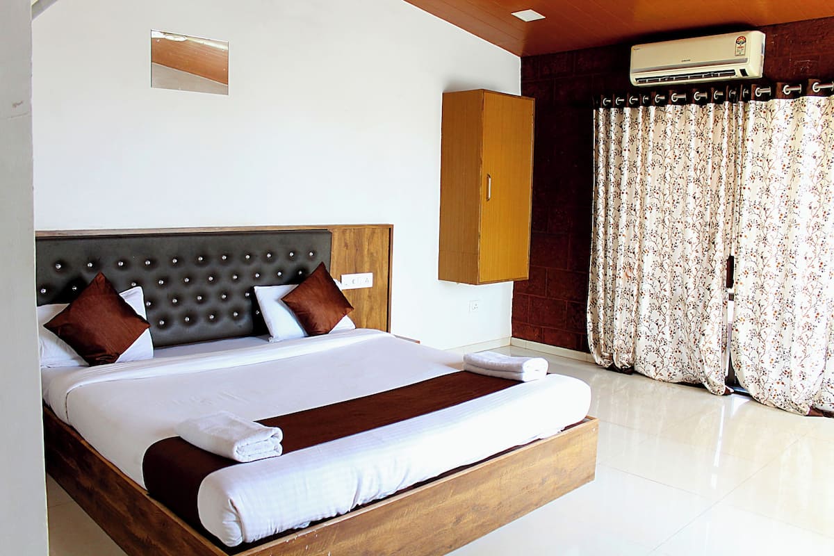 Kamar Standar, AC | Meja kerja, ruang kerja ramah laptop, dan Wi-Fi gratis