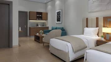 Habitación Deluxe con 1 cama doble o 2 individuales, vistas a la ciudad | Sábanas de algodón egipcio y ropa de cama de alta calidad