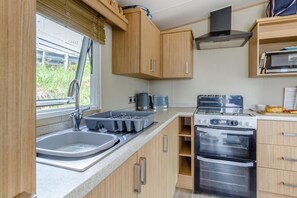 Microwave, oven, cookware/dishes/utensils
