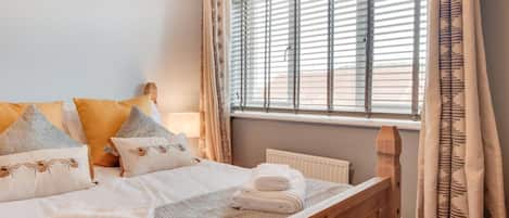 Iron/ironing board, travel crib, free WiFi, bed sheets