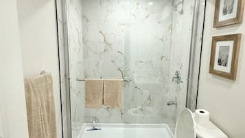 Shower, eco-friendly toiletries, hair dryer, bidet