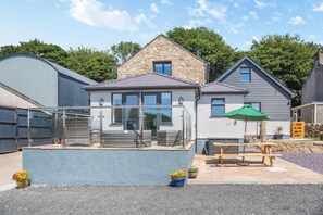 Outdoor dining - 3 Bed in Talwrn (oc-bow229) (Ysgubor Hen)