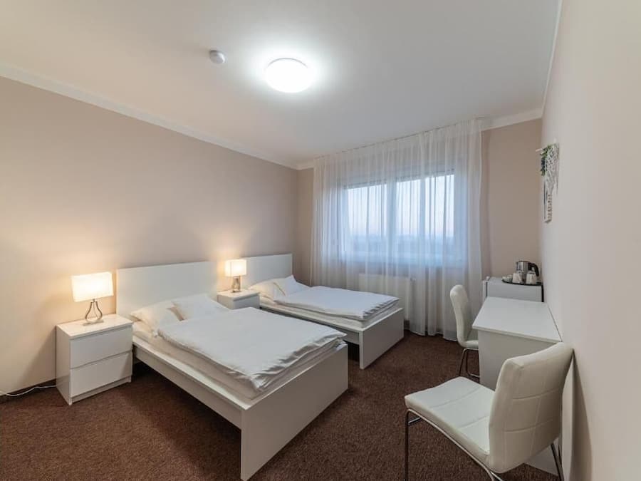 Laptop workspace, blackout curtains, soundproofing, iron/ironing board