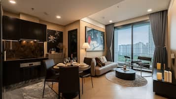 Business Apartment, 3 Bedrooms, Balcony, City View | Minibar, individually decorated, individually furnished, desk