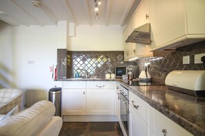 Oven, dishwasher, highchair, cookware/dishes/utensils - 3 Bed in St. Gennys (oc-l28162) (Crackington Haven)
