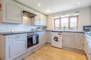 Oven, dishwasher, highchair, cookware/dishes/utensils