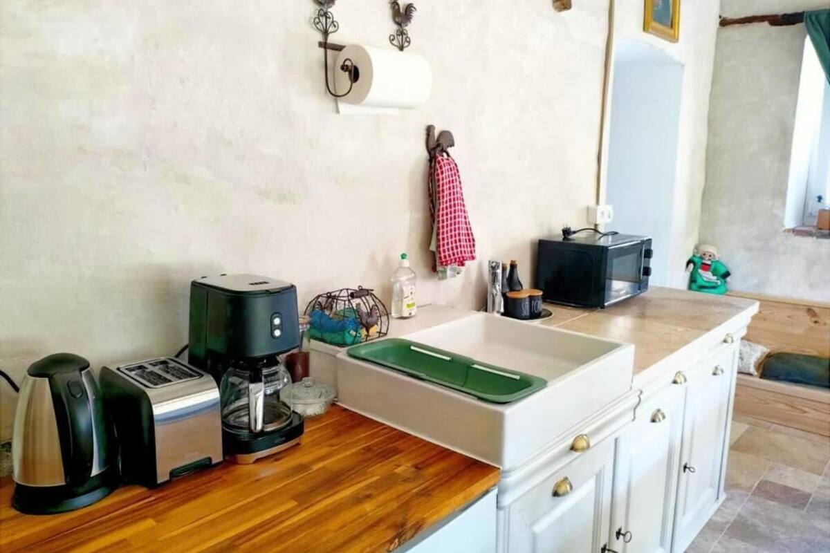 Réfrigérateur dans l'espace commun, micro-ondes dans l'espace commun