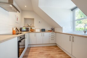 Microwave, oven, cookware/dishes/utensils