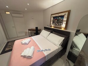 2 habitaciones, tabla de planchar con plancha, wifi y ropa de cama 