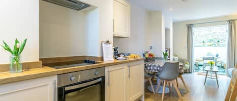 Oven, highchair, cookware/dishes/utensils