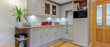 Oven, dishwasher, highchair, cookware/dishes/utensils