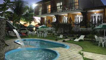 2 outdoor pools, open 8:00 AM to 8:00 PM, pool umbrellas, pool loungers