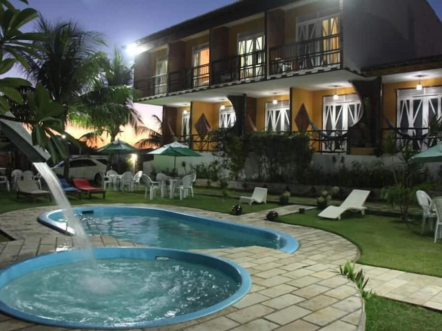 2 outdoor pools, open 8:00 AM to 8:00 PM, pool umbrellas, pool loungers