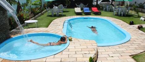 2 outdoor pools, open 8:00 AM to 8:00 PM, pool umbrellas, pool loungers