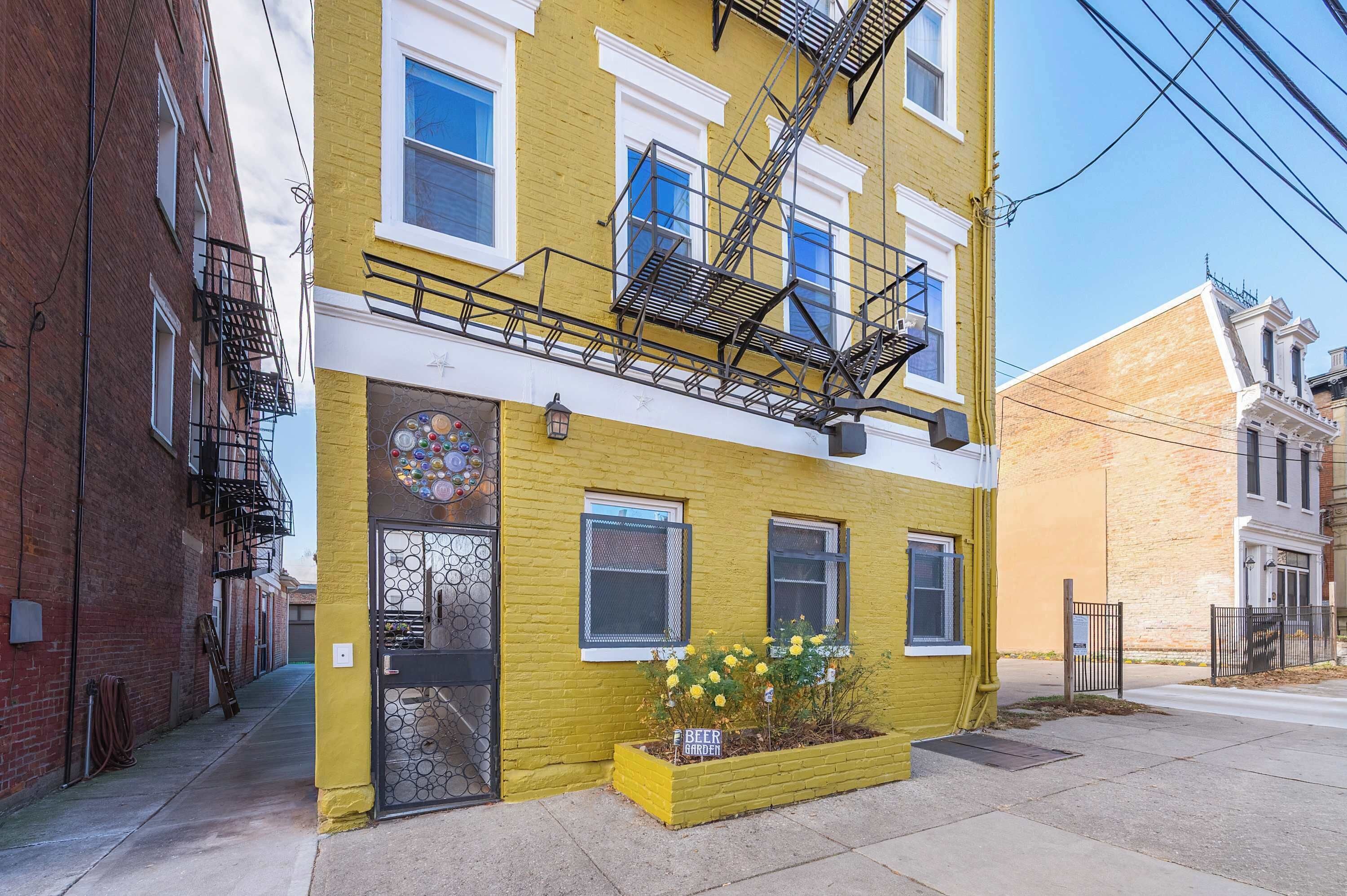 Historic Yellow Brick building in OTR — steps from Findlay Market
