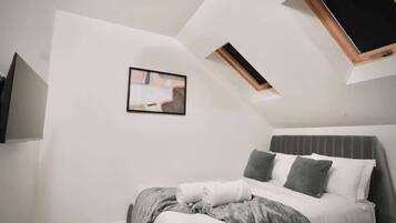 4 bedrooms, iron/ironing board, travel cot, WiFi