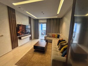 Living area - 🏖️ Apartment 2 steps from the beach - Comfort & Relaxation (Rabat-Salé-Kénitra)