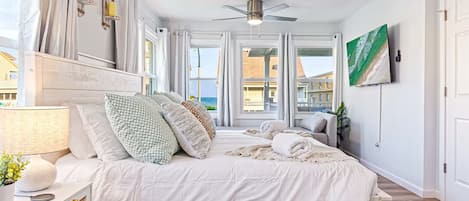 Tabla de planchar con plancha, wifi y ropa de cama