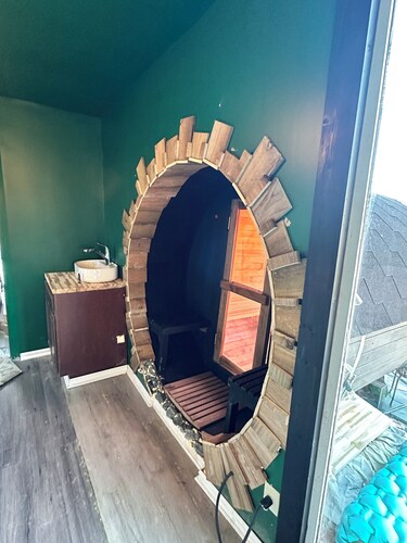 Spacious 6-bedroom charming home with AC and fitness room, and sauna.