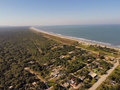 Na praia . Vila Canoa