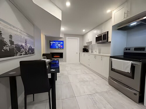 Luxury Walk-Out 2BR Apartment w/ Pool & Fireplace