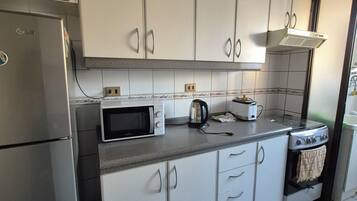 Microwave, oven, toaster, cookware/dishes/utensils