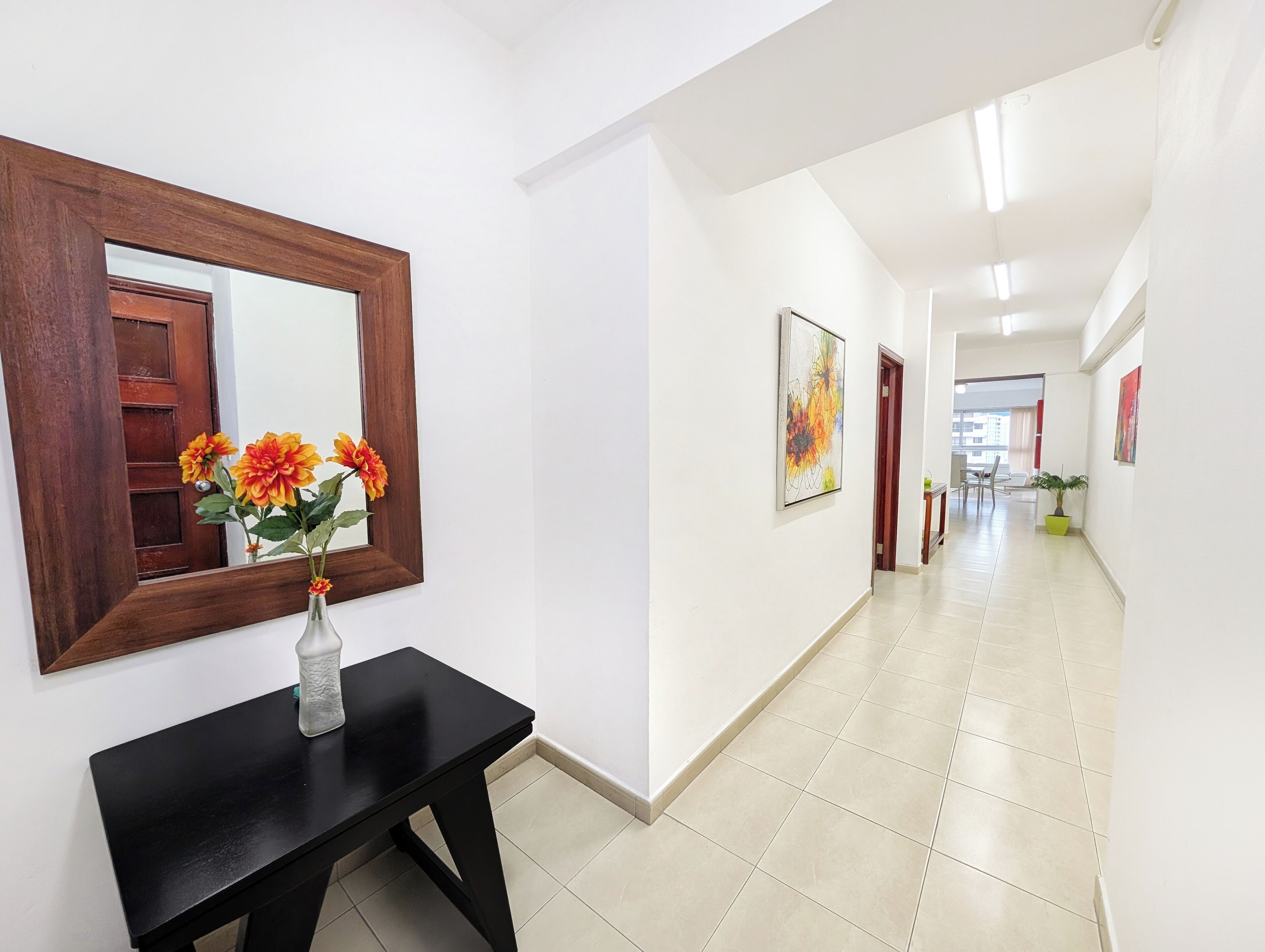 Family Apartment, City View | Living area | Flat-screen TV