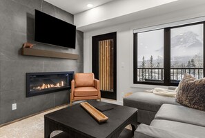 TV, fireplace - Front Row To The Mountains | Soak In The Scenery (Canmore)