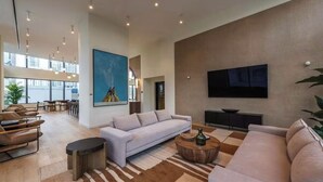 Living area - NEW amenity-rich studio near Hard rock Stadium by SLS & ICON developers (Miami)