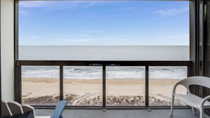 A balcony with a view of the beach and ocean. - Golden Sands 1412, Oceanfront, Pools, Games (Ocean City)
