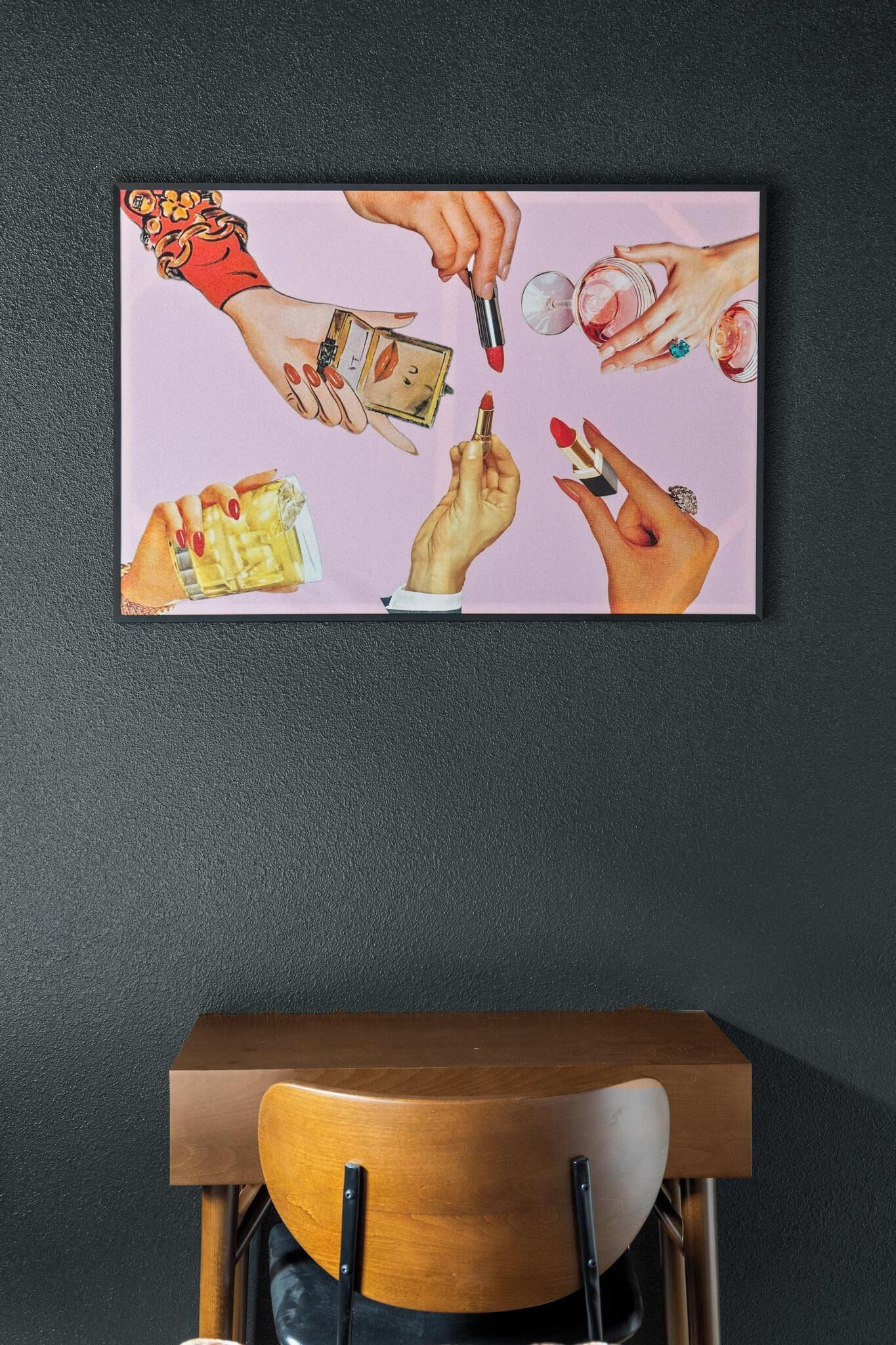 A wall-mounted artwork depicting various hands engaged in different activities.