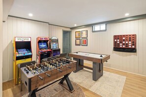 A room with a foosball table, two arcade games, and a pool table. - Sleeps 18+| Hot Tub| Sauna | 7BR Mountain Retreat (Conway)