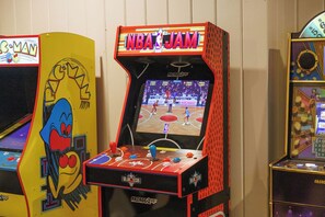 An arcade machine with an NBA JAM game, featuring a large screen and multiple control buttons. - Sleeps 18+| Hot Tub| Sauna | 7BR Mountain Retreat (Conway)