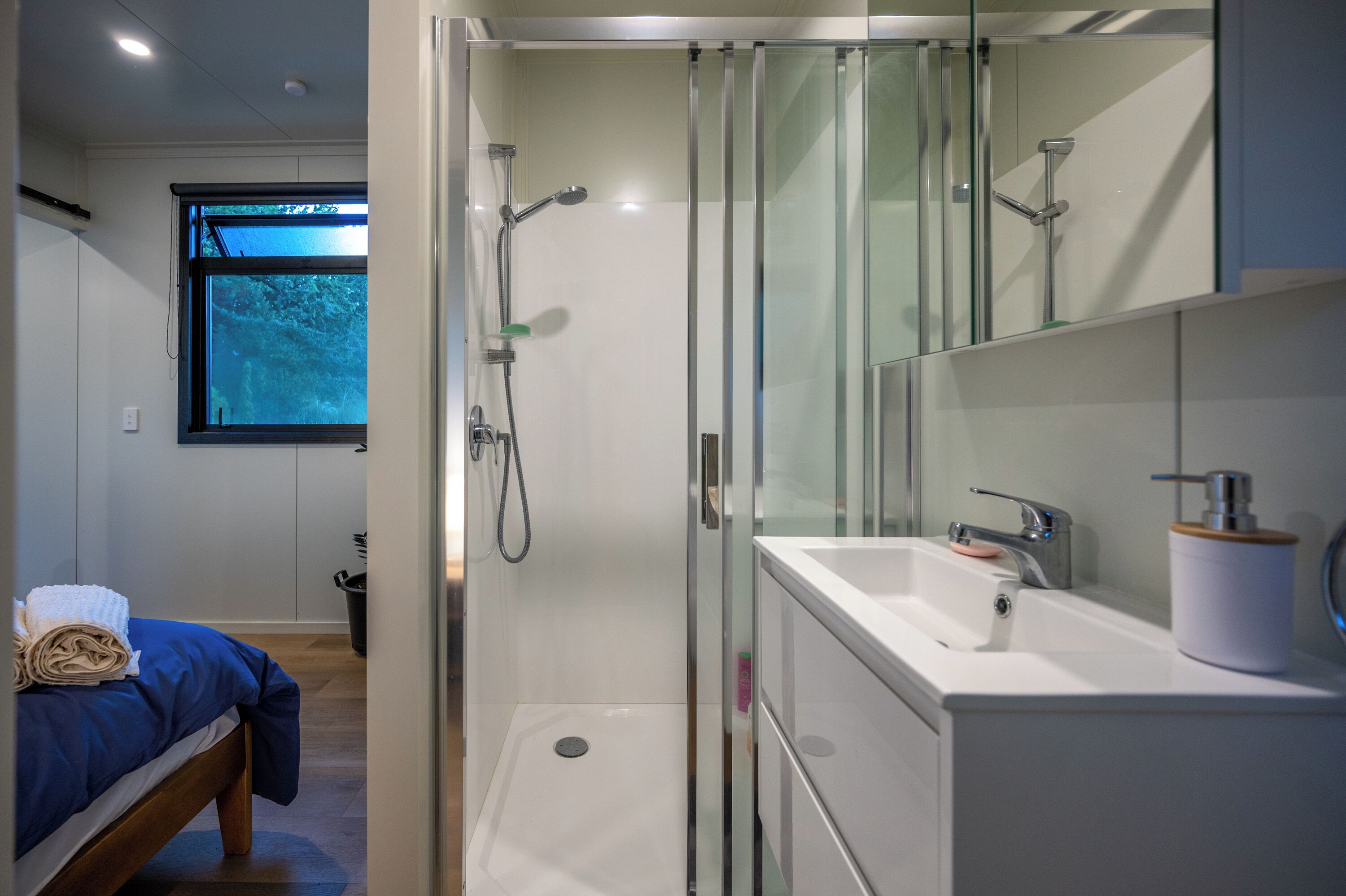 Shower, towels, soap, toilet paper