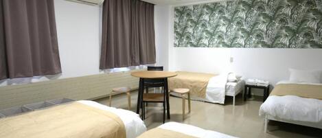 Economy Quadruple Room, City View | Desk, free WiFi, bed sheets