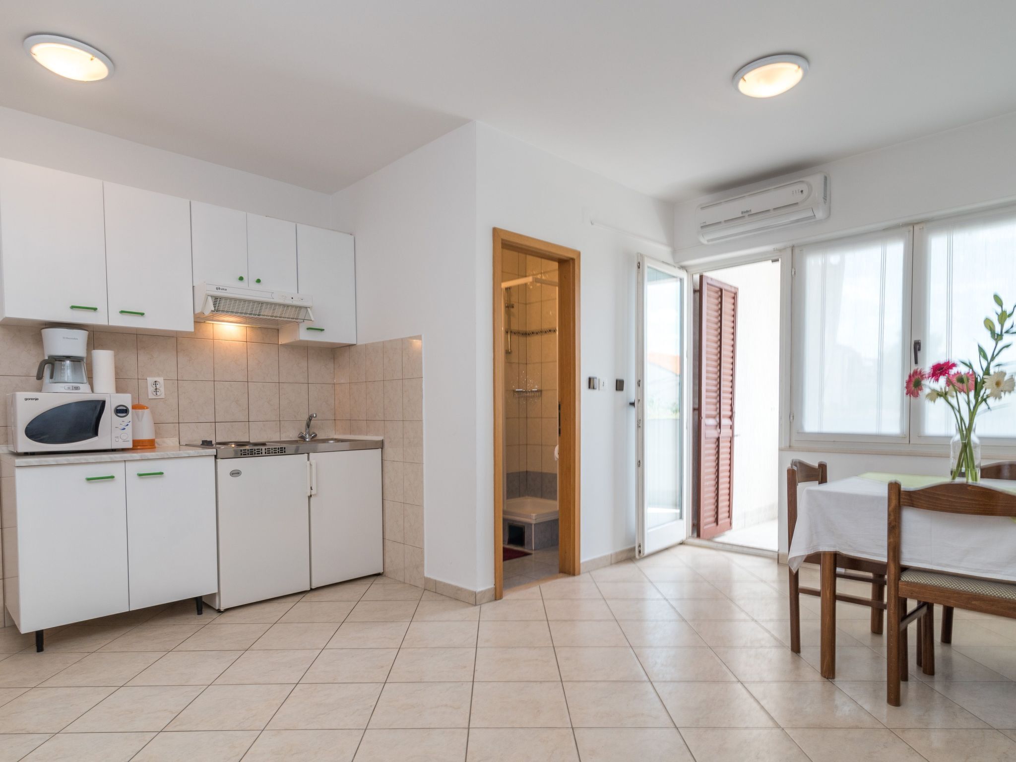 Fridge, microwave, cookware/dishes/utensils